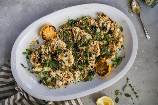 Image of Mother Raw Cauliflower Steaks on the grill